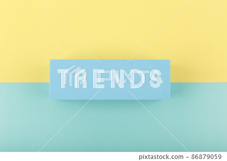 Trends written on rectangle on light multicolored yellow and aqua blue background Trends written on rectangle on light multicolored yellow and aqua blue background 86879059