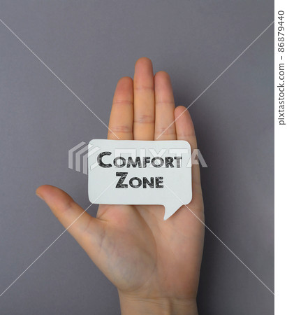 the inscription on the business card comfort zone. The girl is holding a note with a message in her hand. Mental health. 86879440