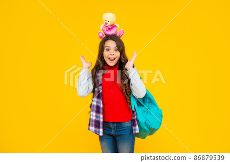 back to school. knowledge day. concept of education. kid in casual clothes on yellow background back to school. knowledge day. concept of education. kid in casual clothes on yellow background 86879539