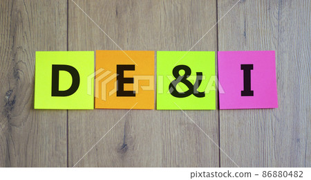 DEI, Diversity, equity and inclusion symbol. Concept words DEI, diversity, equity and inclusion on paper on beautiful wooden background. Business, DEI, diversity, equity and inclusion concept. 86880482