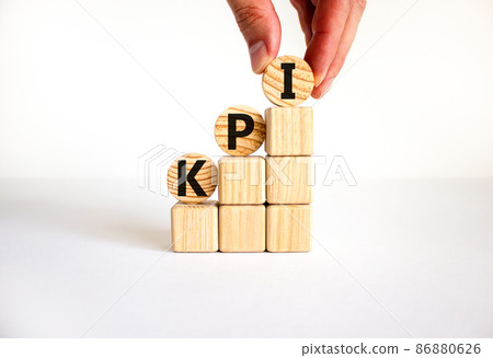 KPI, key performance indicator symbol. Concept word KPI, key performance indicator on wooden circles on beautiful white background, copy space. Business, KPI, key performance indicator concept. 86880626