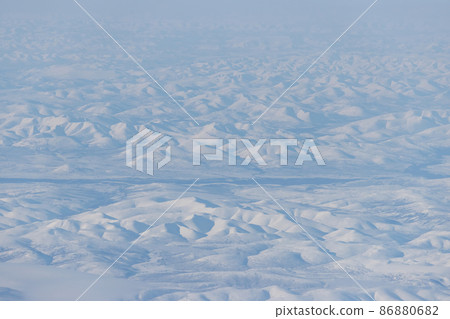 Aerial view of snow-capped mountains Aerial view of snow-capped mountains 86880682