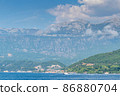 Scenic panoramic landscape view on Bay of Kotor, Montenegro with mountains at sundown. 86880704