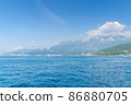 Scenic panoramic landscape view on Bay of Kotor, Montenegro with mountains at sundown. 86880705