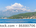 Scenic panoramic landscape view on Bay of Kotor, Montenegro with mountains at sundown. 86880706