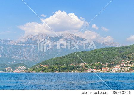 Scenic panoramic landscape view on Bay of Kotor, Montenegro with mountains at sundown. 86880706