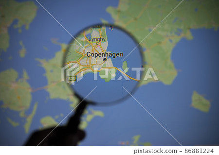 the city of Copenhagen seen through a magnifying glass 86881224