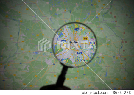 the city of Berlin seen through a magnifying glass 86881228