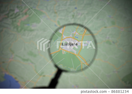 the city of Ljubljana seen through a magnifying glass the city of Ljubljana seen through a magnifying glass 86881234