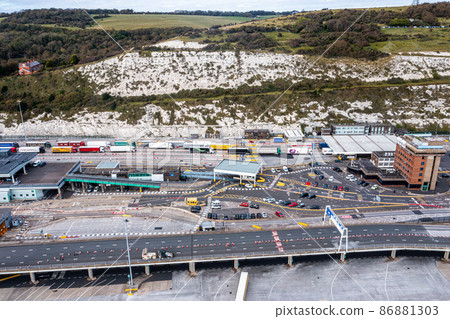 Aerial view of harbour and trucks parked along side each other getting ready for embarking the Dover Ferry to Calais Aerial view of harbour and trucks parked along side each other getting ready for embarking the Dover Ferry to Calais 86881303