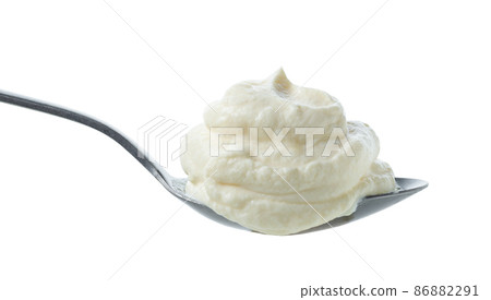 spoon of cream cheese 86882291