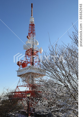 Blue sky snow scene and TV tower (Shonandaira) 86882648