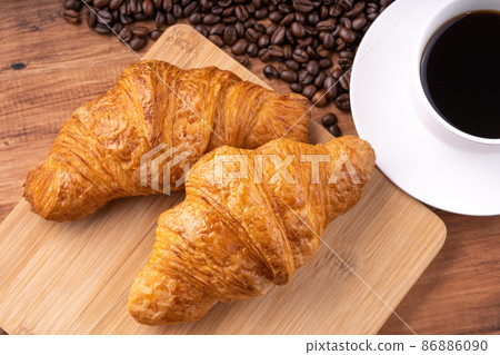Croissants and coffee 86886090