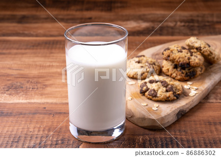 Oatmeal chocolate cookies and milk Oatmeal chocolate cookies and milk 86886302