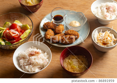 Fried oysters and dried plum rice table 86891959