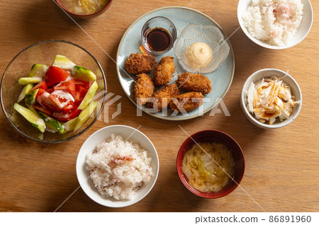 Kaki fry and pickled plum rice table Kaki fry and pickled plum rice table 86891960