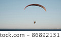 Paragliders against the blue sky. Air sports.. Active rest outside the city. 86892131