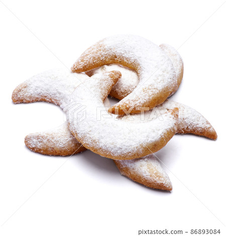 Traditional German or Austrian Vanillekipferl vanilla kipferl cookies isolated on white background Traditional German or Austrian Vanillekipferl vanilla kipferl cookies isolated on white background 86893084