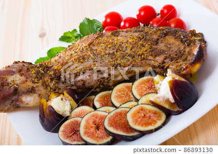 Lamb hind quarter baked in oven Lamb hind quarter baked in oven 86893130