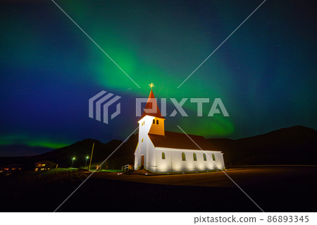The Northern Light Aurora borealis over Vik Church 86893345