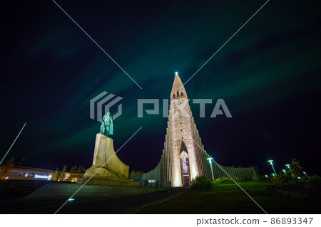 Northern lights shining over the church in Reykjavik Northern lights shining over the church in Reykjavik 86893347