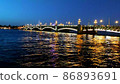 Static view of night St. Petersburg steel bridge, drawbridge. Media. Neva river scenic backlight reflection. Road traffic. Travel landmark sight. 86893691