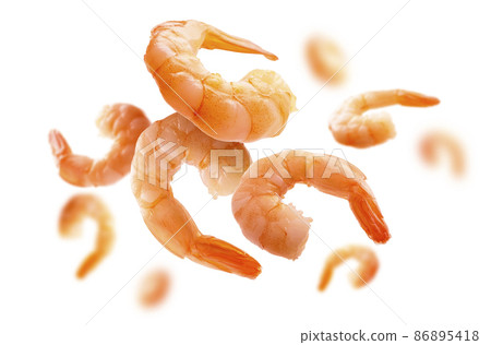 Boiled prawns levitate on a white background 86895418