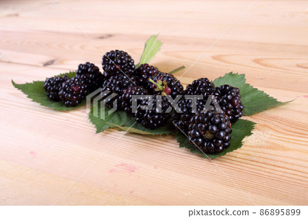Blackberries on table 86895899