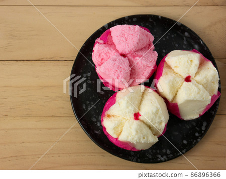 The Chinese fluffy rice flour cake on wood table for celebration day 86896366