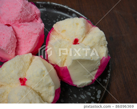 The Chinese fluffy rice flour cake on wood table for celebration day The Chinese fluffy rice flour cake on wood table for celebration day 86896369