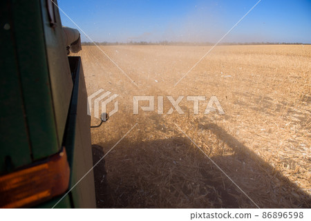 Aerial Agriculture. Wheat harvesting in the autumn. Aerial Agriculture. Wheat harvesting in the autumn. 86896598