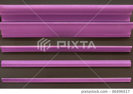 Purple pink ceiling skirting board material for repair and interior design of the corners of the ceiling of the house inside 86896817