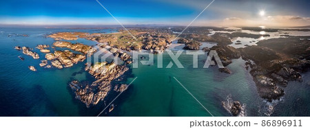 The beautiful Cloughglass bay and beach by Burtonport in County Donegal - Ireland The beautiful Cloughglass bay and beach by Burtonport in County Donegal - Ireland 86896911