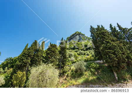 Hill called Rocca di Garda on the coast of Lake Garda - Verona Italy 86896913