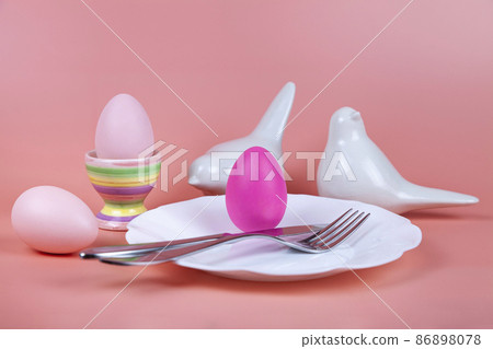 Easter table setting and dinner with  festive decorations 86898078