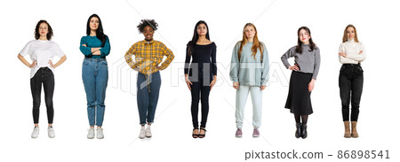 Feminism, women's rights. Set of different, multi ethnic people, young women standing isolated over white background, Horizontal flyer, banner. Feminism, women's rights. Set of different, multi ethnic people, young women standing isolated over white background, Horizontal flyer, banner. 86898541