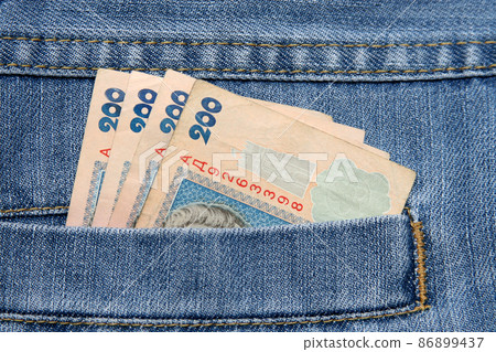 Jeans pocket and money 86899437