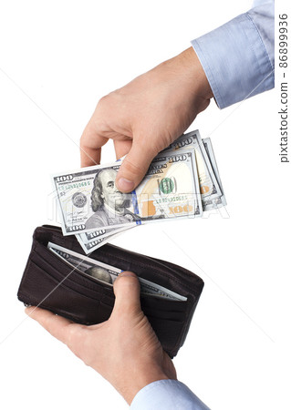 Taking Cash From a Wallet - Stock Image 86899936