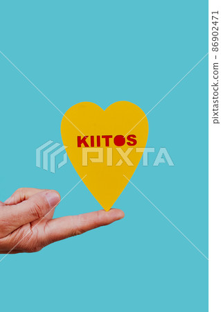 man and heart with the text thank you in finnish 86902471