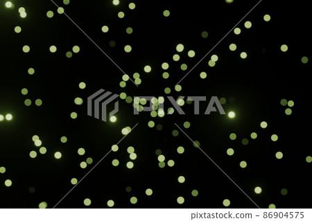 Defocused bokeh lights on black background, an abstract naturally blurred backdrop for Valentines Day or birthday party. Festive light texture. Green blue garland in blur 86904575