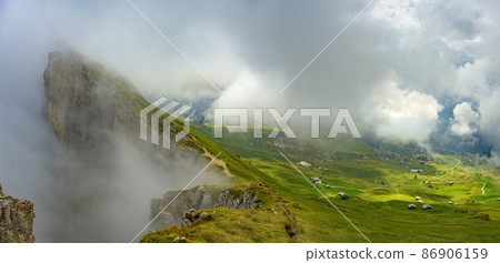 Panorama view Dolomites mountains from Seceda over Odle Puez 86906159