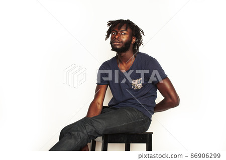 young handsome african american man gesturing emotional posing isolated on white background stylish hipster. youth concept young handsome african american man gesturing emotional posing isolated on white background stylish hipster. youth concept 86906299