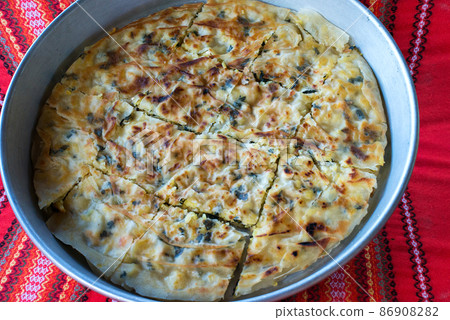 Bulgarian national dish Patatnik, made from potatoes and cheese - selective focus 86908282
