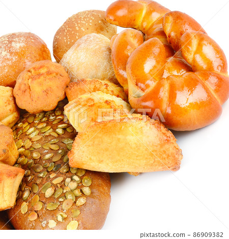 Bread and sweet pastries isolated on white . Bread and sweet pastries isolated on white . 86909382