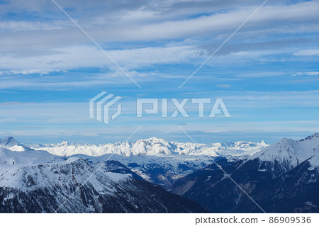 View from Mount Darlux in Grisons, Switzelrand, on a beautiful winter day View from Mount Darlux in Grisons, Switzelrand, on a beautiful winter day 86909536
