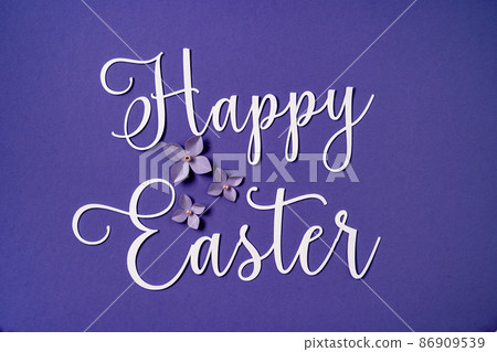 Happy Easter greeting postcard with paper floral design. Minimalistic composition. Paper art. Color trends 2022 very peri Happy Easter greeting postcard with paper floral design. Minimalistic composition. Paper art. Color trends 2022 very peri 86909539