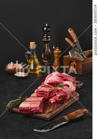 Raw fresh beef short ribs on cutting board Raw fresh beef short ribs on cutting board 86909554