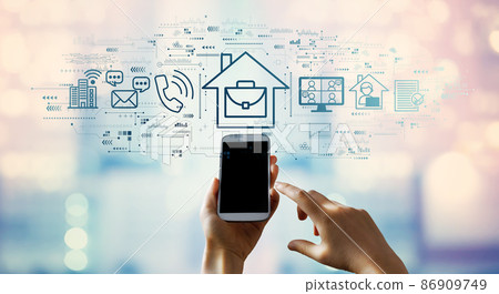 Telework theme with person using smartphone Telework theme with person using smartphone 86909749
