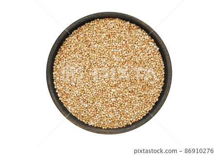 Wooden bowl of green buckwheat, gluten free organic grains. Isolated on white, view from above. 86910276