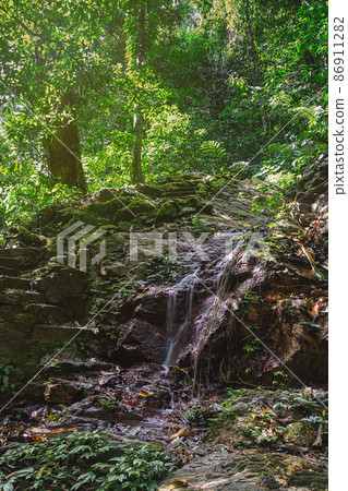 Amazing waterfall in green forest Laong Rung Waterfall Yala Thailand Amazing waterfall in green forest Laong Rung Waterfall Yala Thailand 86911282